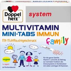 Verpackung von Multivitamin Mini-Tabs mit Lächelnden Familienzeichnungen.